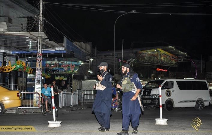 Islamic State army policemen carry out night patrol in Mosul Islamic state army policemen carry out night patrol in mosul