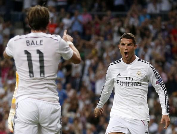 Real Madrid forward Cristiano Ronaldo celebrates with teammate Gareth Bale after scoring against FC Basel in their Champions League group game Gareth Bale Cristiano Ronaldo Real Madrid