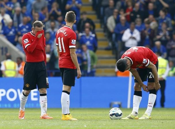 Manchester United forwards Wayne Rooney, Adnan Januzaj and Robin Van Persie are left shell shocked after the incredible comeback from Leicester City in their English Premier League game Wayne Rooney Adnan Januzaj Robin Van Persie Manchester United