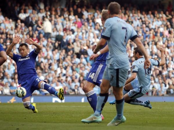 Lampard (extreme right) cleverly loses his marker Ivanovic (not in frame) by making a semi-circular run around him, to connect with Milner's (second from right) cross, as Terry (extreme left) attempts a last-ditch block in vain. lampard