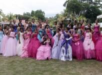 Female cancer patients pose for a group photo during their Quinceanera party at a hotel in Managua on 20 September 2014.