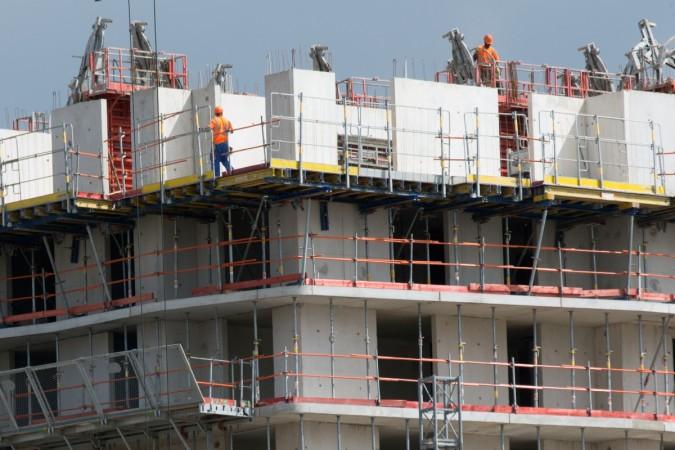 Labourers work at a construction site (Representation Image) Construction Site