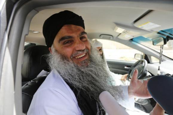 Radical cleric Abu Qatada speaks to the media after his release from prison near Amman Radical Muslim cleric Abu Qatada speaks to the media after his release from prison near Amman September 24, 2014.