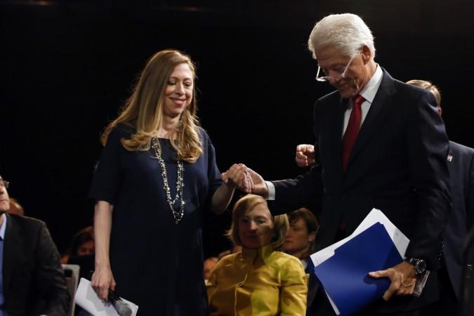Bill and Hillary Clinton have become grandparents on Friday as their daughter, Chelsea, gave birth to a healthy baby girl. (Photo: Former U.S. President Bill Clinton helps his daughter Chelsea Clinton to the stage during the closing plenary session titled Bill and Hillary Clinton have become grandparents on Friday as their daughter, Chelsea, gave birth to a healthy baby girl.