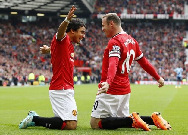 Wayne Rooney celebrates with Rafael after scoring the first goal for Manchester United Rafael Wayne Rooney Manchester United