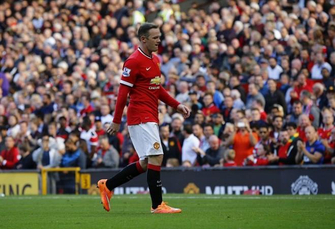Manchester United forward Wayne Rooney walks off the field after receiving a straight red card in the English Premier League game against West Ham Wayne Rooney Manchester United