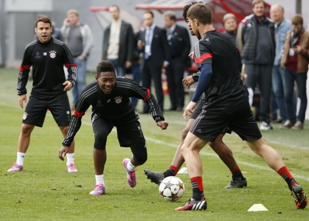 Bayern Munich's players Philipp Lahm (C) and Pierre Hojbjerg (R) attend a training session on the eve of their Champions League Group E match against CSKA Moscow at the Arena Khimki outside Moscow Bayern Munich