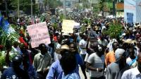 arisitide-supporters-take-to-the-streets-of-haiti