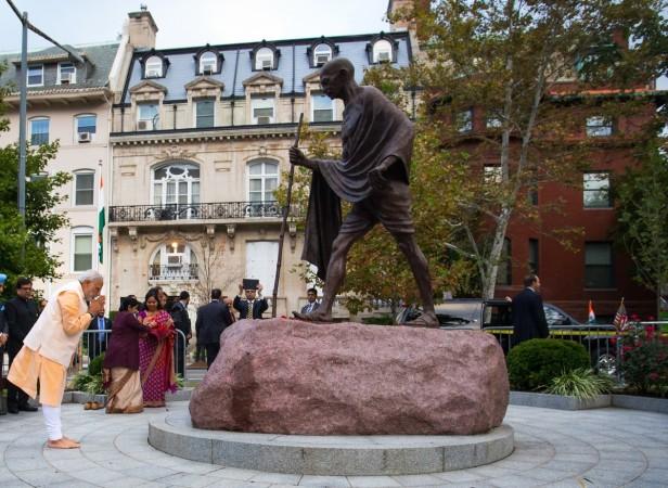 Modi bows to the statue of Mahatma Gandhi