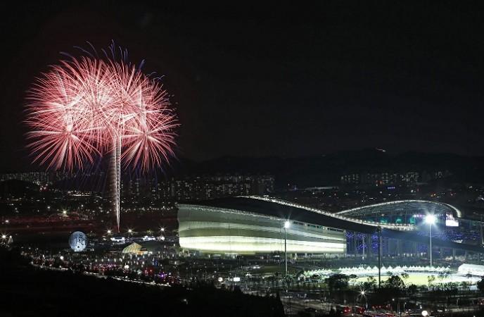 Fireworks explode next to the Asiad Main Stadium during the closing ceremony Asian Games 2014 Closing Ceremony