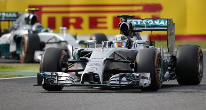 Mercedes drivers Lewis Hamilton (front) and Nico Rosberg during the qualifying session of the Japanese Grand Prix Lewis Hamilton Nico Rosberg Mercedes