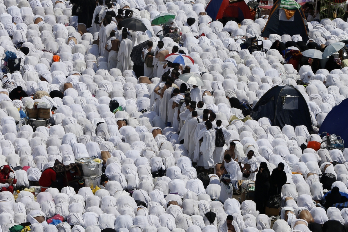 Muslim pilgrims perform Friday prayers around Namirah mosque during Hajj pilgrimage