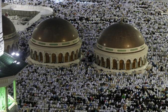 Muslim pilgrims pray near the holy Kaaba (not seen) at the Grand Mosque, during the annual Hajj pilgrimage in Mecca Muslim pilgrims pray around the holy Kaaba at the Grand Mosque in Mecca during Hajj pilgrimage