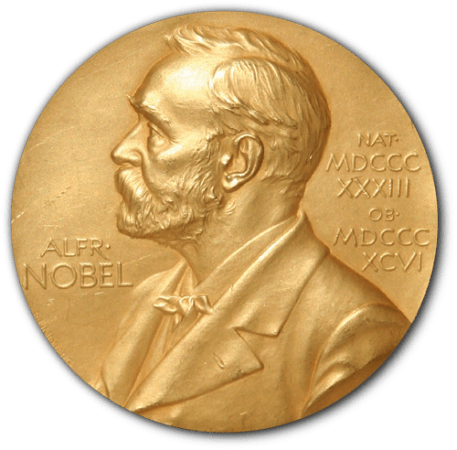 A golden medallion with an embossed image of Alfred Nobel. Nobel Prize