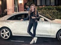 Millionaire Daria Radionova with her diamond-encrusted Mercedes