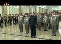 A smiling Kim Jong-un appeared in North Korean state television walking with the aid of a stick.
