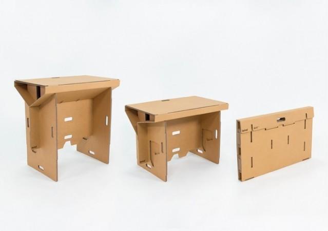 Refold desks can be folded into a sitting position, or a portfolio-like form Refold, portable cardboard desk