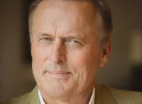 Best-selling author John Grisham defends people who watch child pornography