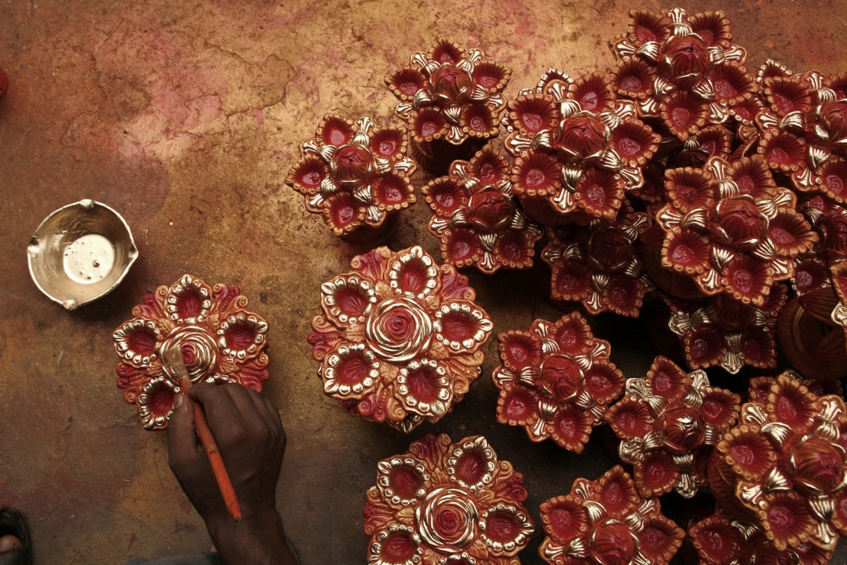 Earthen lamps (diyas) are used during Diwali, the annual festival of lights, to decorate homes and celebrated the festival all over the country Diwali 2014