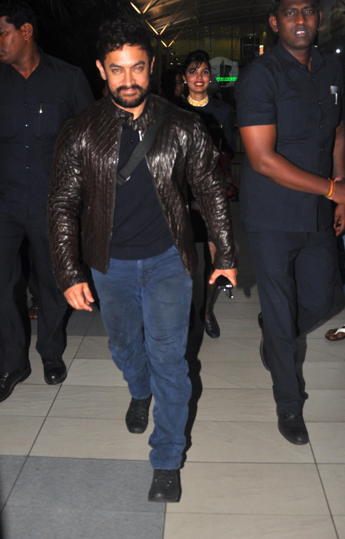 Aamir Khan snapped at the international airport, returning from Cannes. Aamir Khan, Raveena Tandon snapped at Airport