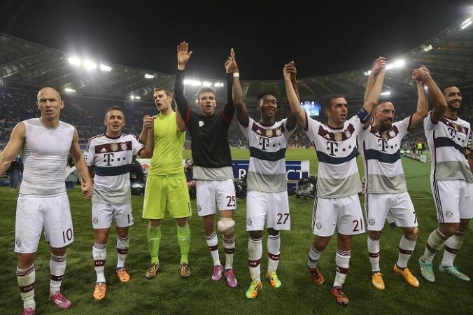 Bayern Munich players celebrate after their victory over Roma in the Champions League Bayern Munich