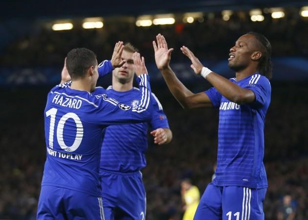 Chelsea's Didier Drogba (R), Branislav Ivanovic (C) and Eden Hazard celebrate after an own goal by Maribor during their Champions League Group G match at Stamford Bridge Chelsea