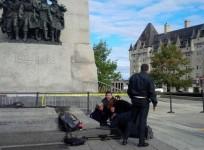 A shooter has attacked the Canada's Parliament in Ottawa. Local residents and paramedics help a Canadian soldier shot by the Lone Wolf.