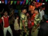 File: Villagers in Tripura celebrate Kali Puja with security personnel Villagers in Tripura celebrate Kali Puja with security personnel