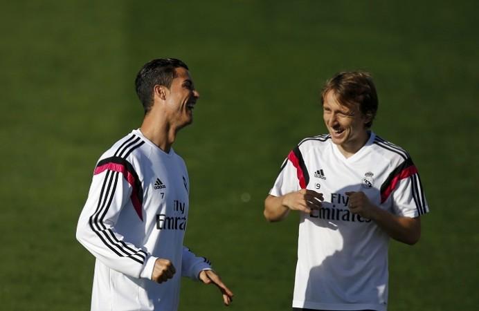 Cristiano Ronaldo and Luka Modric share a laugh during a training session Cristiano Ronaldo Real Madrid Luka Modric