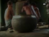 people-work-with-religious-harmony-in-metal-bell-bowl-making-unit