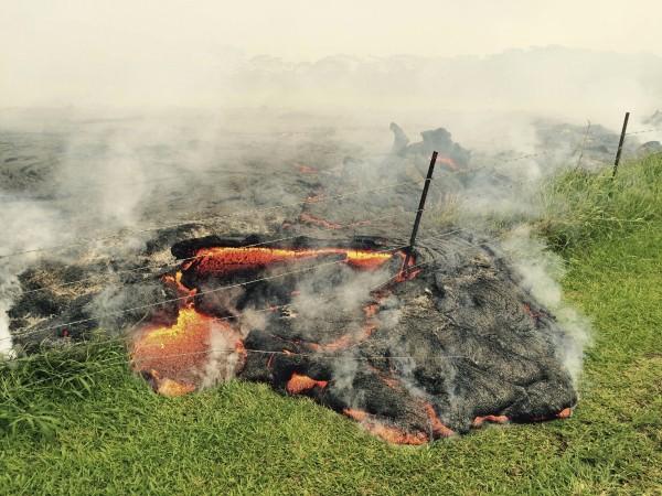 The lava flow from the Kilauea Volcano is seen near the village of Pahoa, Hawaii. Lava flow from the Kilauea Volcano in Hawaii advances towards residential area