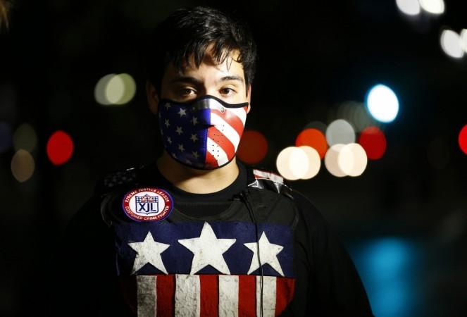 Freedom Fighter of the Xtreme Justice League looks out from behind his mask while on patrol in San Diego Freedom Fighter of the Xtreme Justice League