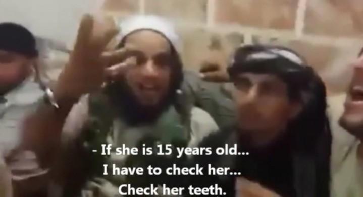 A newly released chilling video shows ISIS jihadists negotiating price for Yazidi sex slave girls as young as 15. A newly released chilling video shows ISIS jihadists negotiating price for Yazidi sex slave girls as young as 15.
