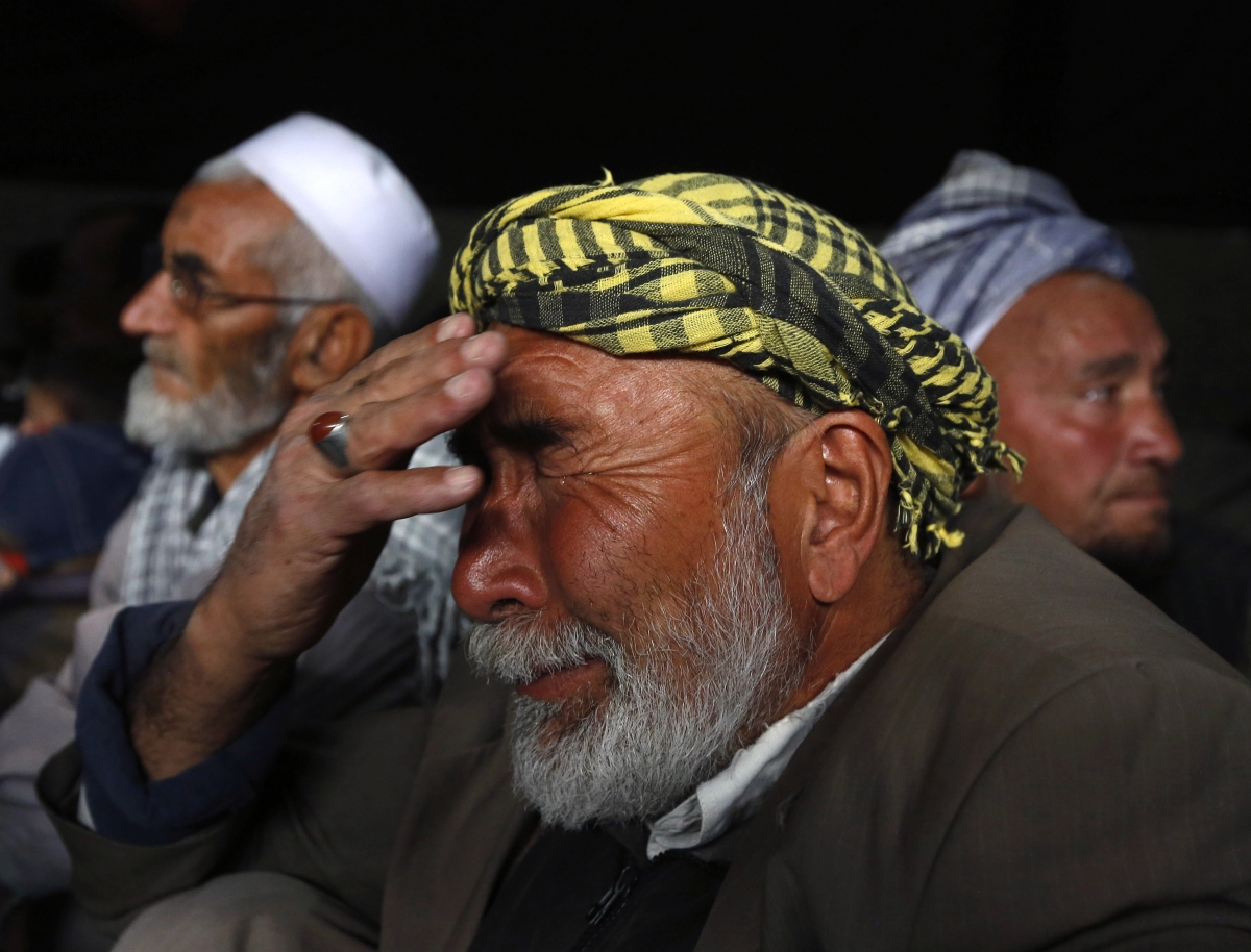 Muslim man cries as he attends a Muharram procession in Kabul