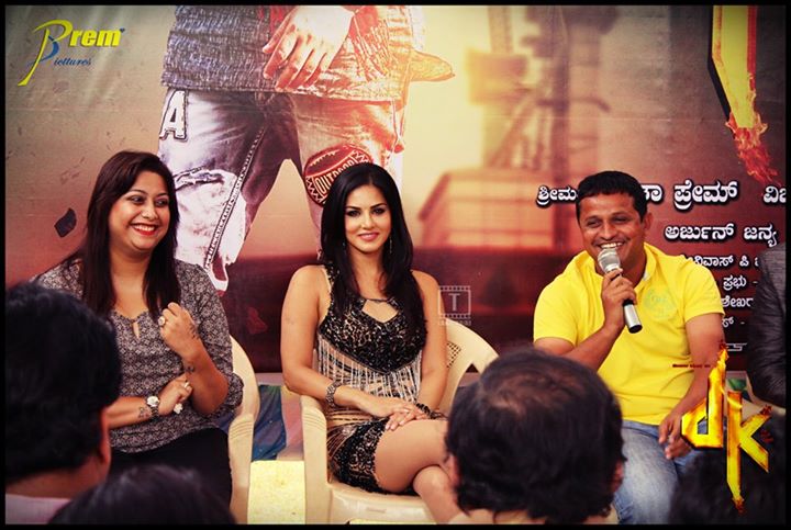 A picture from the press meet. Rakshita, Sunny Leone & director Vijay Hampali