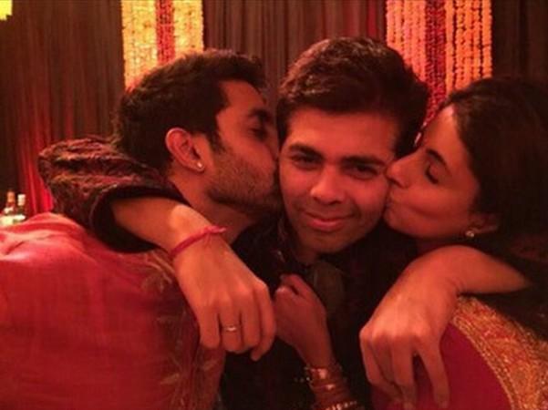 Abhishek Bachchan and Shweta Nanda kissing Karan Johar Abhishek Bachchan, Shweta Nanda and Karan Johar