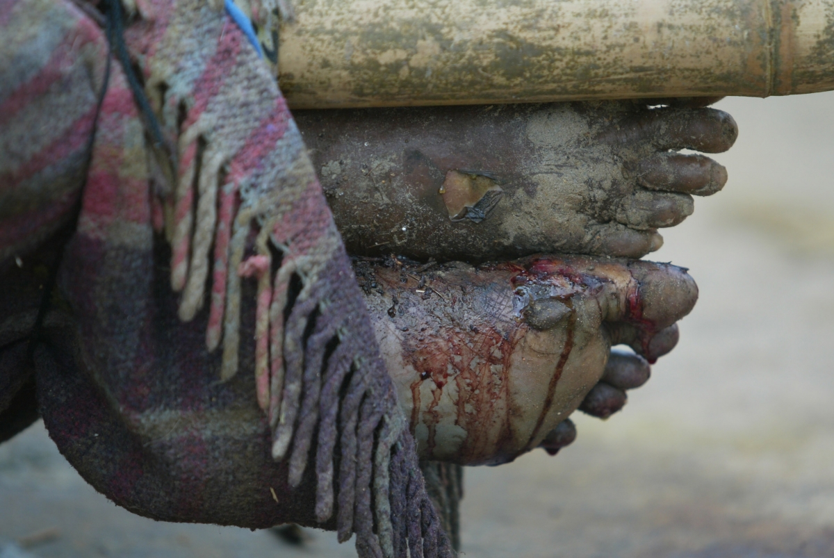 The body of a tsunami victim lies on a roadside in Unawatuna, 6 km (3.7 miles) south of Galle, Sri Lanka Waves of Tsunami 2004 destroyed countries and killed many people