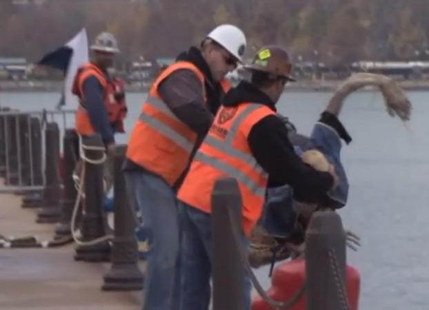 Rescue workers pull a zombie out of Lake Michigan Rescue workers pull a zombie out of Lake Michigan
