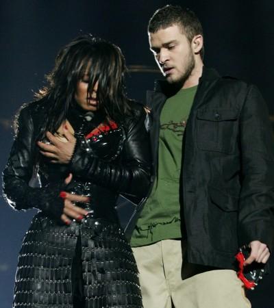 Janet Jackson (L) reacts after fellow singer Justin Timberlake ripped off one of her chest plates at the end of their half time performance at Super Bowl XXXVIII in Houston, February 1, 2004. Jackson turned heads on Sunday night during a half-time appearance with Timberlake during the Carolina Panthers-New England Patriots game, bumping and grinding through a duet. Just as the song came to its close, Timberlake reached for Jackson and tore part of her black leather bustier, revealing one breast. Janet Jackson reacts after fellow singer Justin Timberlake ripped off one of her chest plates at Super Bowl XXXVIII in 2004.