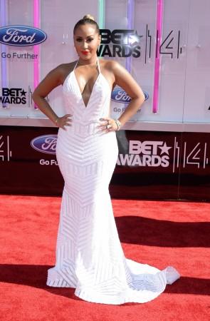 Adrienne Bailon arrives at the 2014 BET Awards in Los Angeles, California June 29, 2014. Adrienne Bailon arrives at the 2014 BET Awards