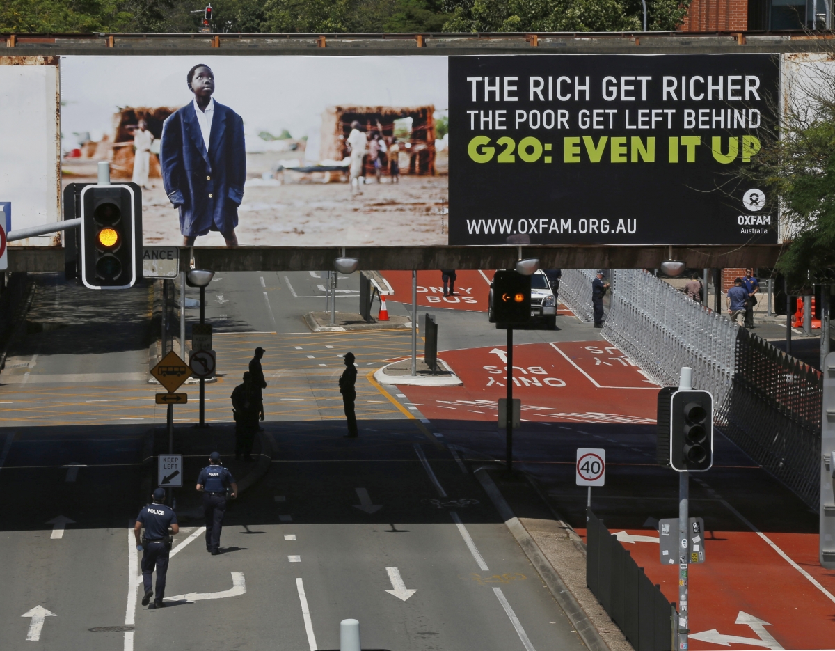 The resounding billboard that didn't go unnoticed. Police guards clear the streets near the venue of the annual G20 Summit in Brisbane G20 Summit 2014