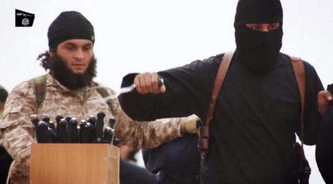 The latest ISIS video of Peter Kassig's beheading has sparked speculations if the last American Hostage, a 26-year-old woman, would be the next. The Peter Kassig beheading video shows Jihadi john leading Americna aid worker's killing along with a gruesome mass execution of 16 other Syrian soldiers.