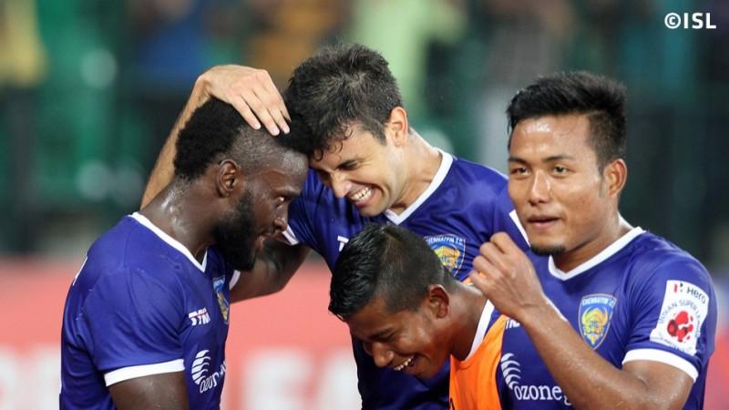 Chennaiyin FC's Bruno Pelissari is congratulated by his teammates following his goal against FC Pune City. Chennaiyin FC
