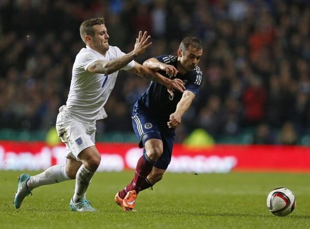 Arsenal midfielder Jack Wilshere has caught the eye for England in a deep midfield role Jack Wilshere England Shaun Maloney Scotland