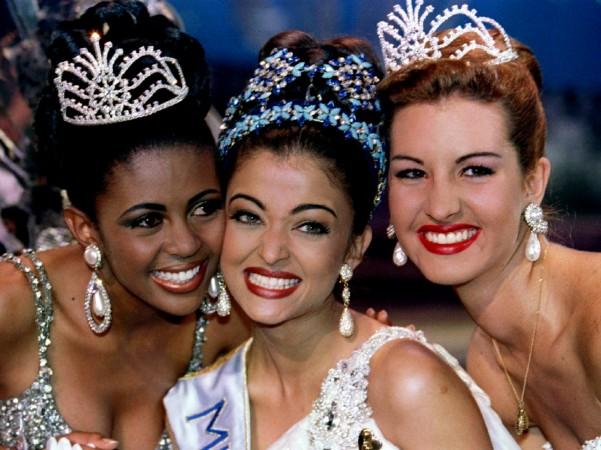 Miss South Africa Basetsane Julia Makgalemele (L), Miss India Aishwarya Rai (C) and Miss Venezuela Irene Izquierdo (R) smile for photographers moments after Rai was crowned Miss World 1994 November 19. Aishwarya Rai Bachchan