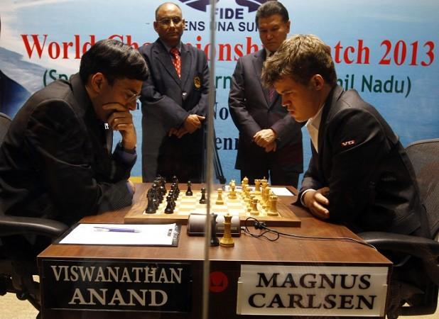 Viswanathan Anand and Magnus Carlsen of Norway during their Tenth match at  FIDE World Chess