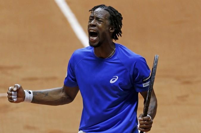 Gael Monfils is pumped up after winning a point against Roger Federer in the Davis Cup final Gael Monfils Davis Cup final