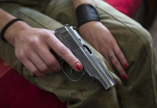 Woman with a pistol