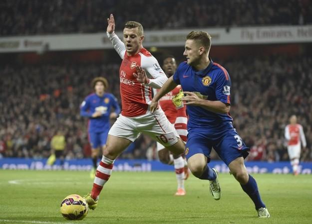 Arsenal midfielder Jack Wilshere (L) could be out for a considerable time with an ankle injury Jack Wilshere Arsenal Luke Shaw Manchester United