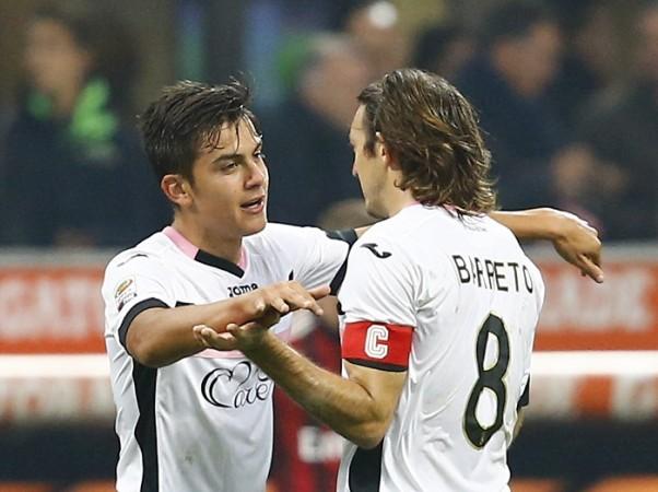 Paulo Dybala (L) is reportedly closing in on a summer move to Arsenal Paulo Dybala Edgar Osvaldo Palermo